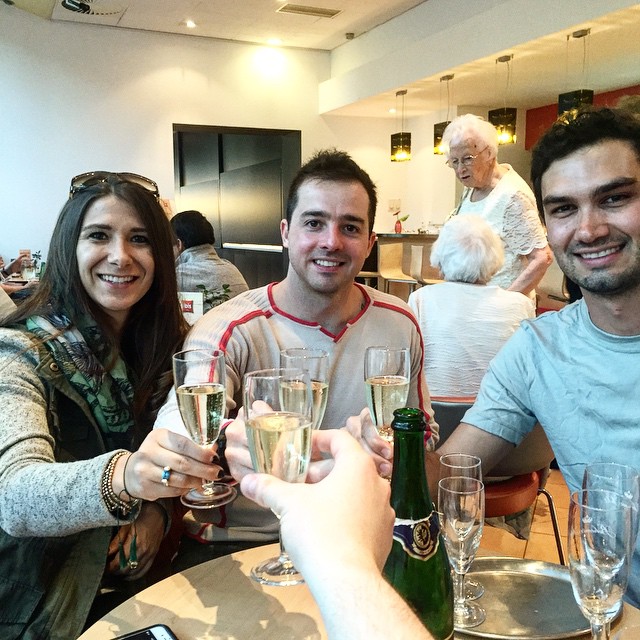 Nissa, Chris and Chris toast with (not-pictured) Sam to their arrival.